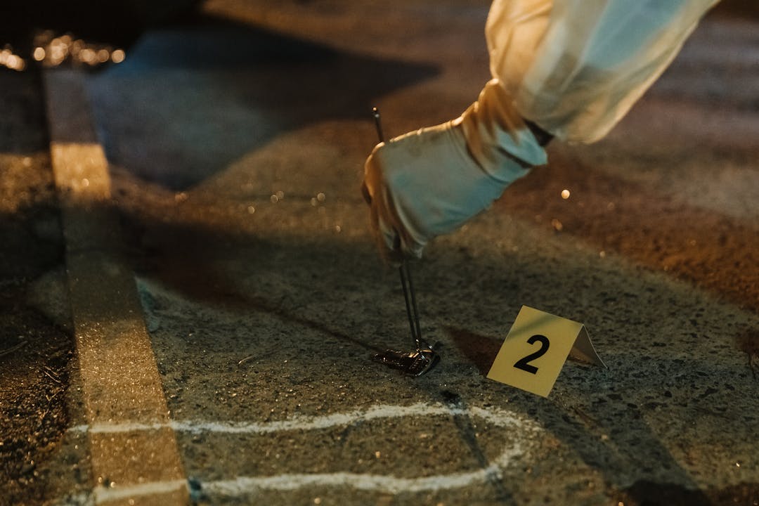 Person looking concerned at computer screen showing security warning