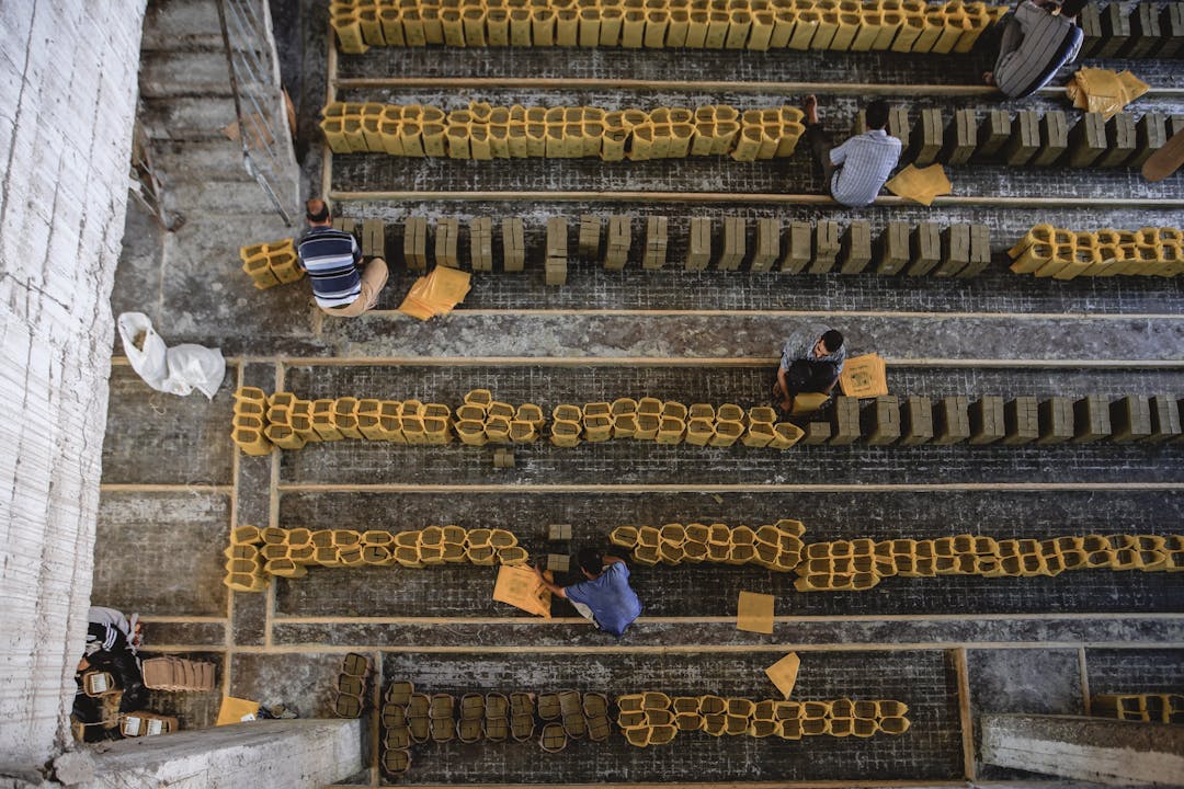 Multiple hands coming together showing coordination and collaborative effort