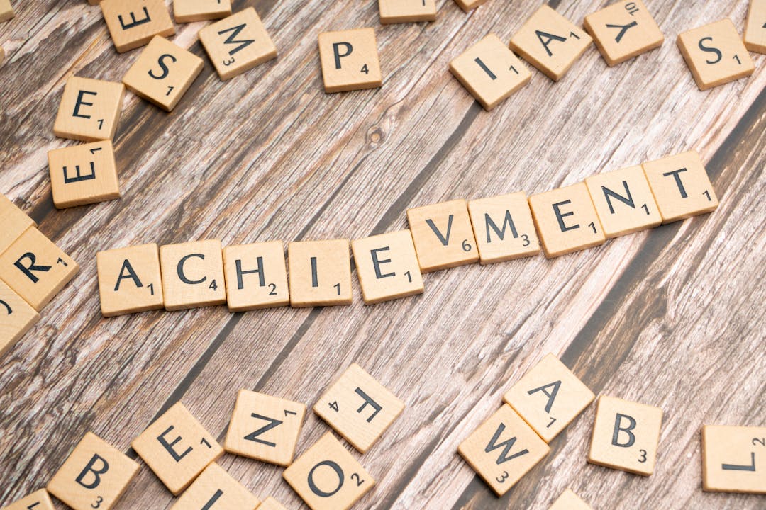 Business team celebrating achievement of specific measurable milestone or contract signing