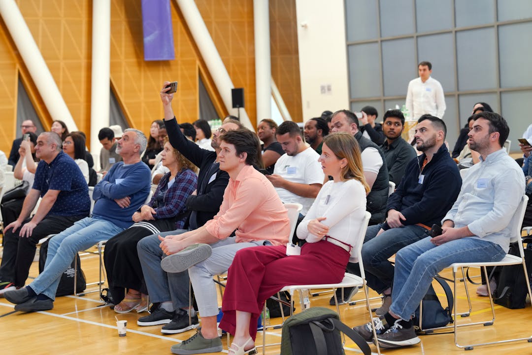 Team members collaborating and sharing technical knowledge during training session