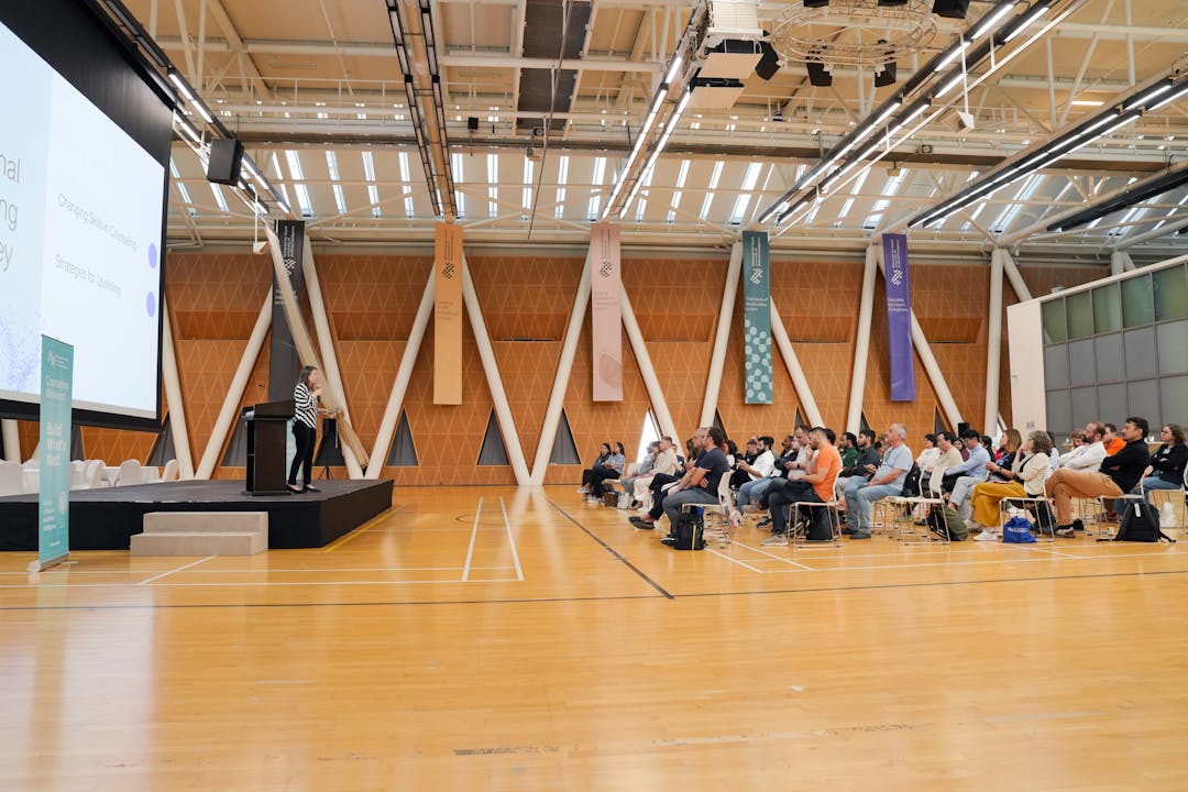 Two professionals in transition meeting reviewing operational procedures together