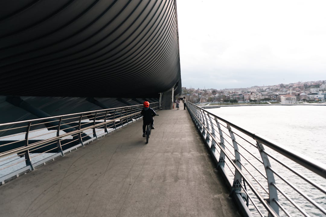 Modern bridge spanning water connecting two sides representing successful negotiation