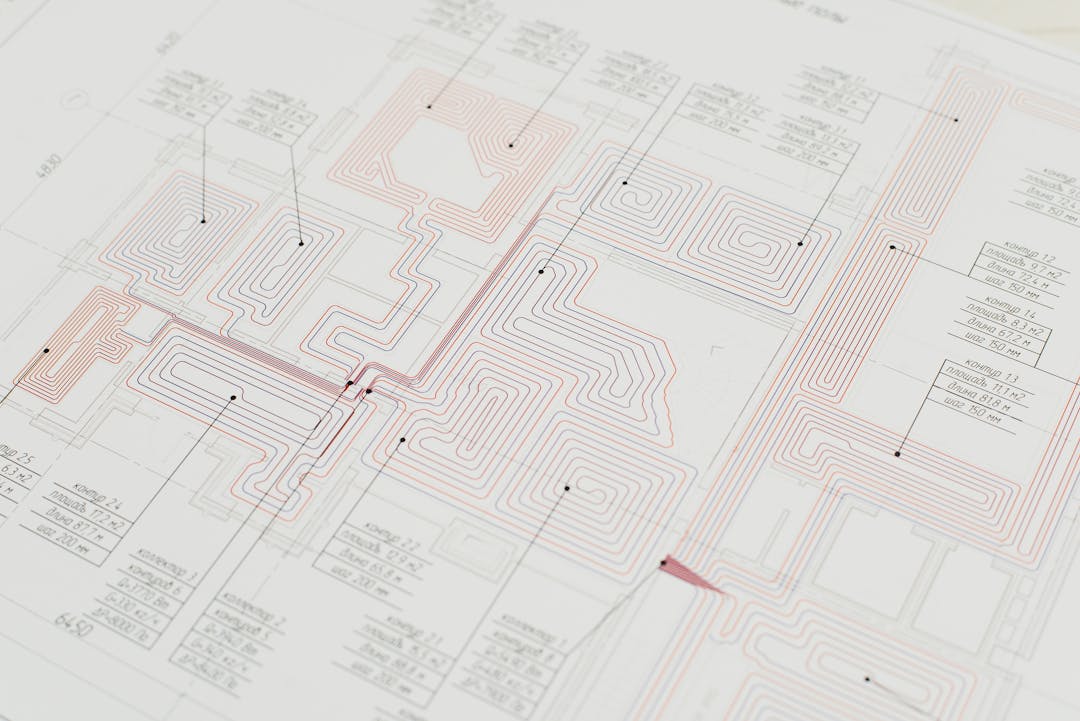 Hands carefully constructing architectural model showing strategic foundation building process