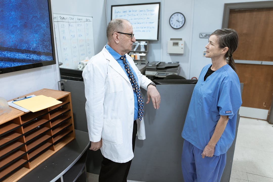 Medical professional analyzing critical patient information, representing systematic organizational assessment