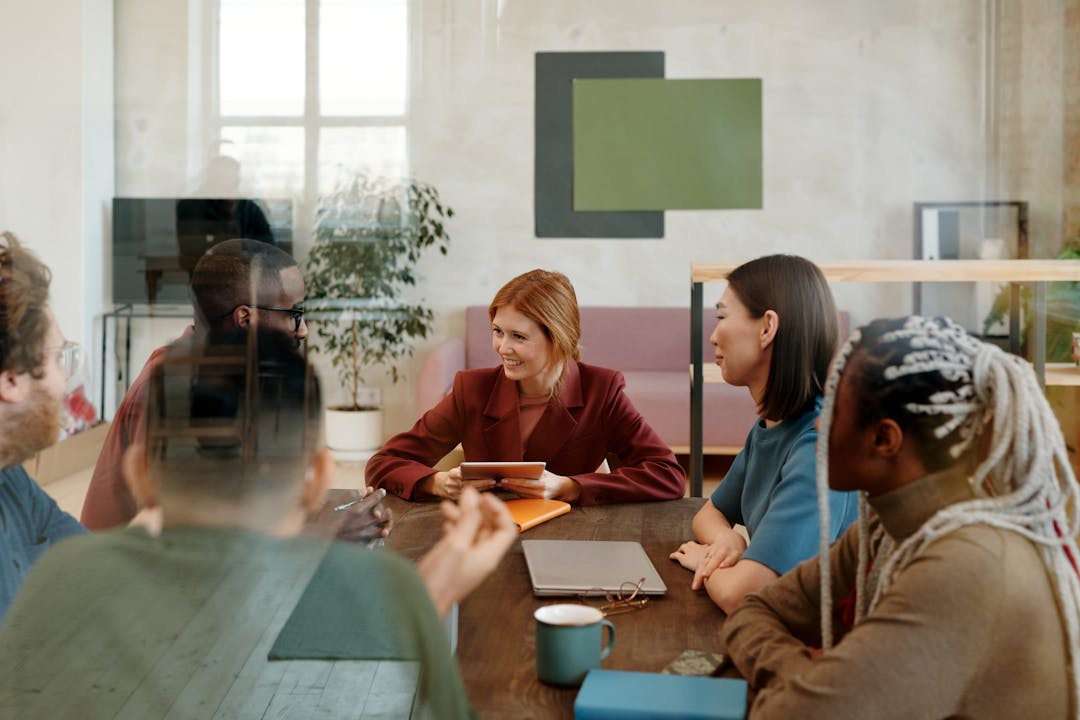 Employee sharing honest feedback during conversation, authentic workplace communication moment