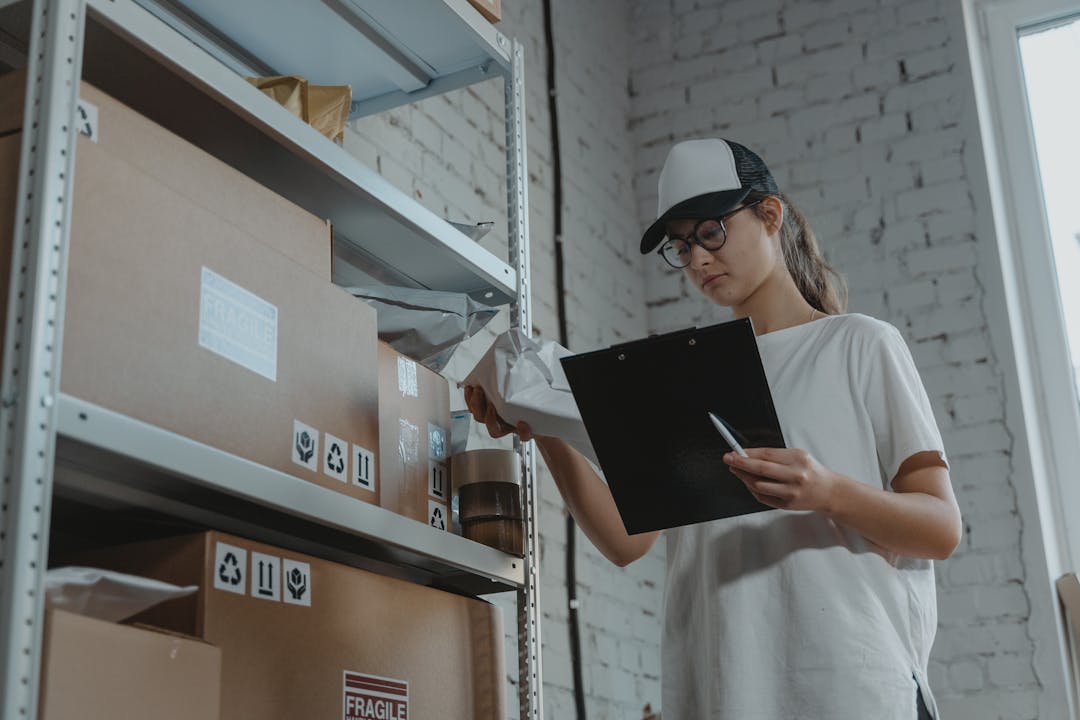 Industrial warehouse shelves filled with inventory and manufactured goods