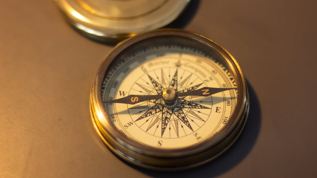 Precision compass with needle indicating true direction for accurate navigation decisions