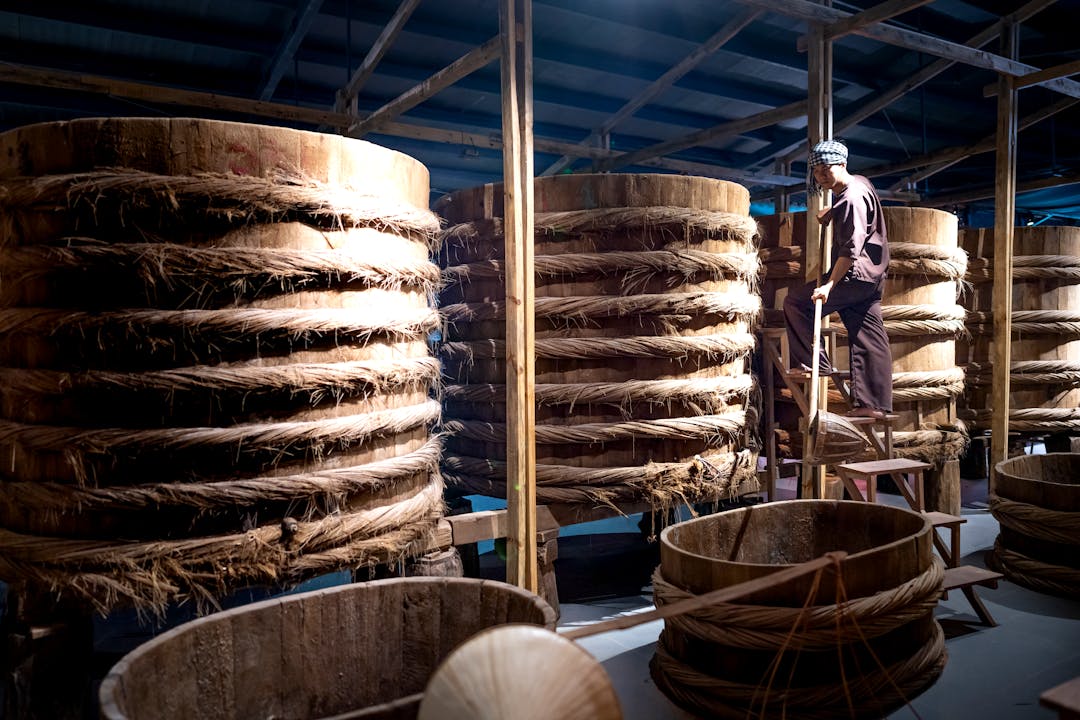 Food manufacturing facility warehouse with ingredient storage and production equipment