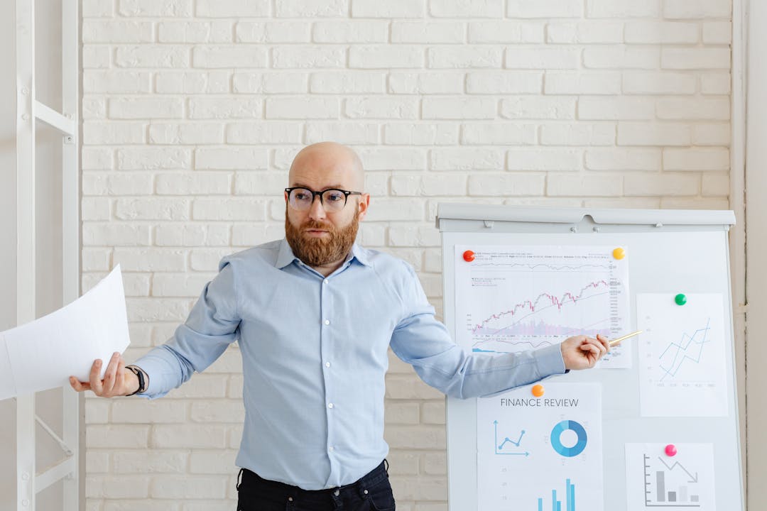 Business owner confidently presenting customer health data to potential buyers