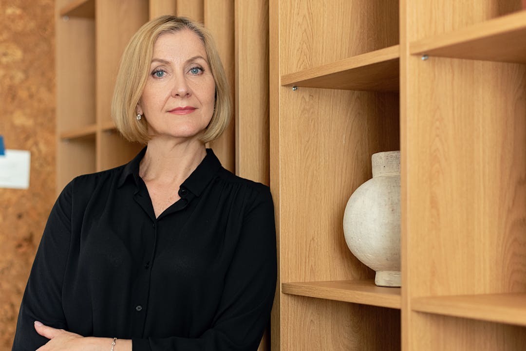 Professional business executive in thoughtful pose showing confidence and experience