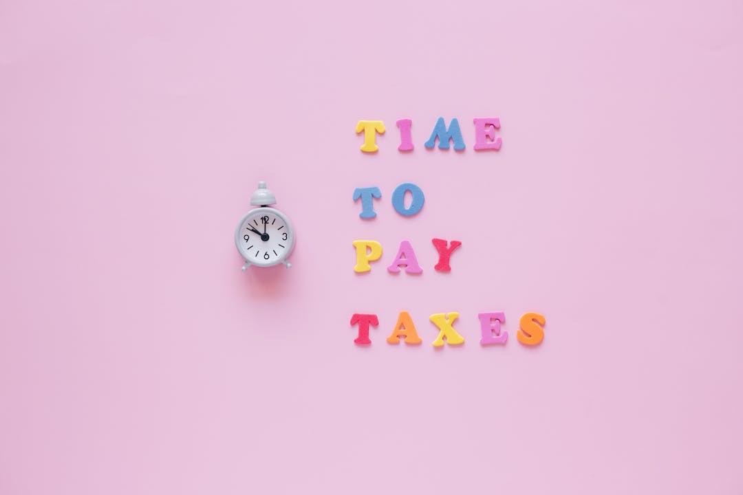 Clock face and calendar pages representing extended project timelines and deadlines