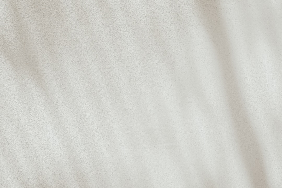 Close-up of hands signing a legal document