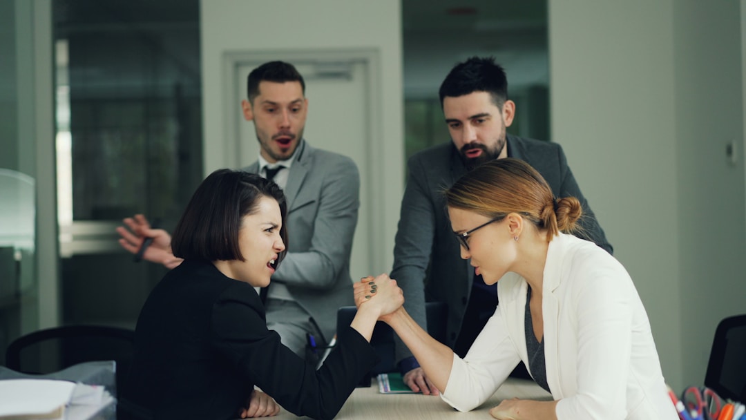 Mixed group of employees displaying varied expressions of concern and disconnection