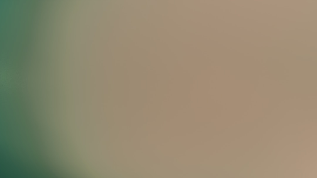 Mountain climber reaching summit representing successful completion of compliance preparation