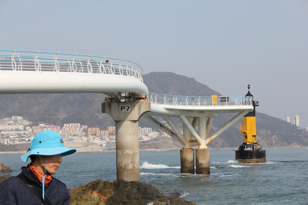 Engineers collaborating on bridge construction project showing sustainable competitive advantage building