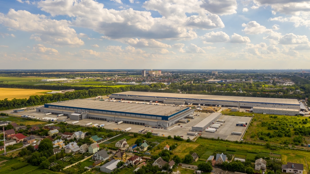 Vintage manufacturing floor showing chemical processing equipment from 1980s era