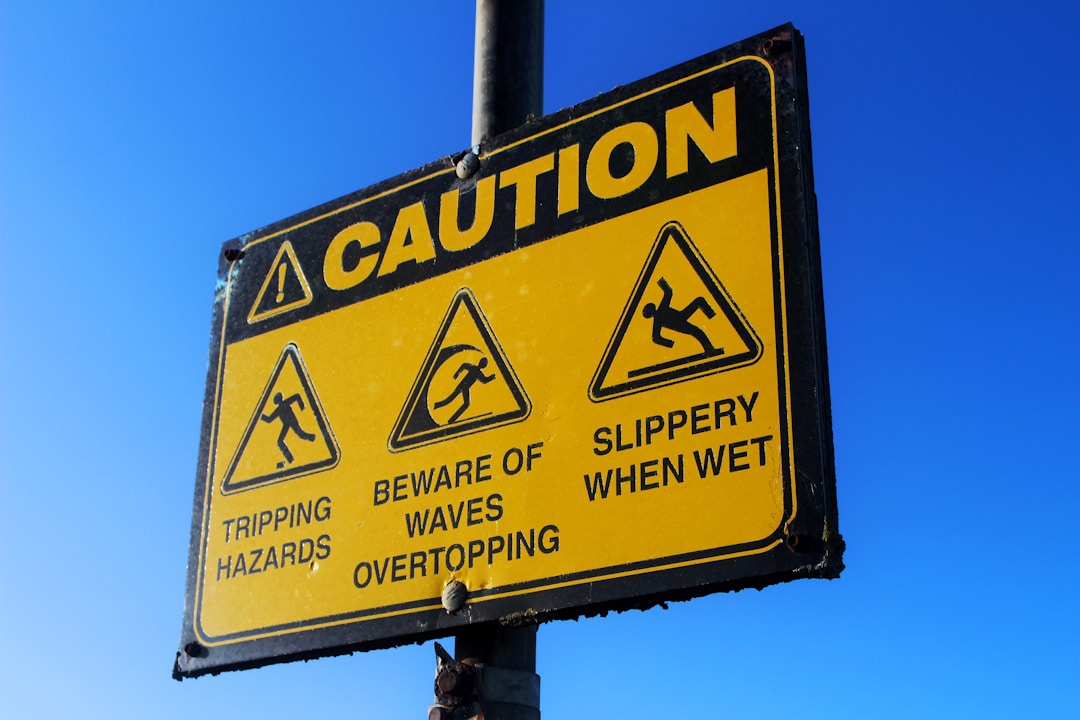 Traffic warning signs on road symbolizing caution and awareness of potential business risks