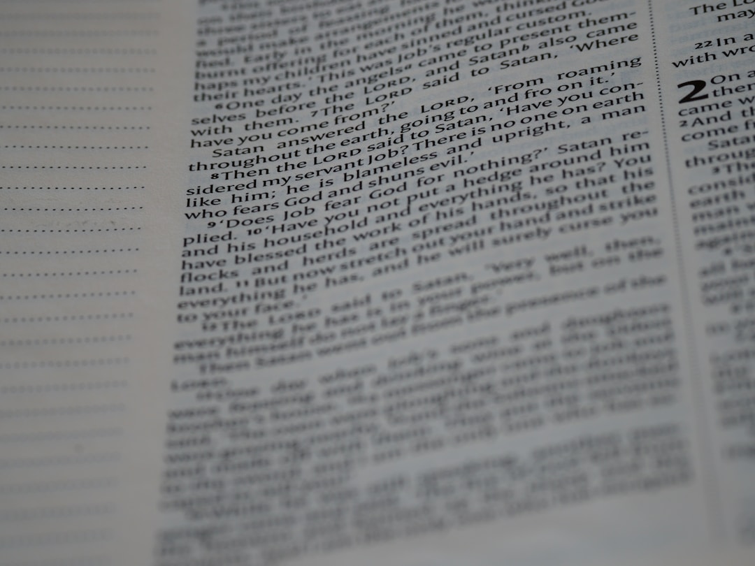 Detailed view of legal contract clauses and definitions being reviewed carefully