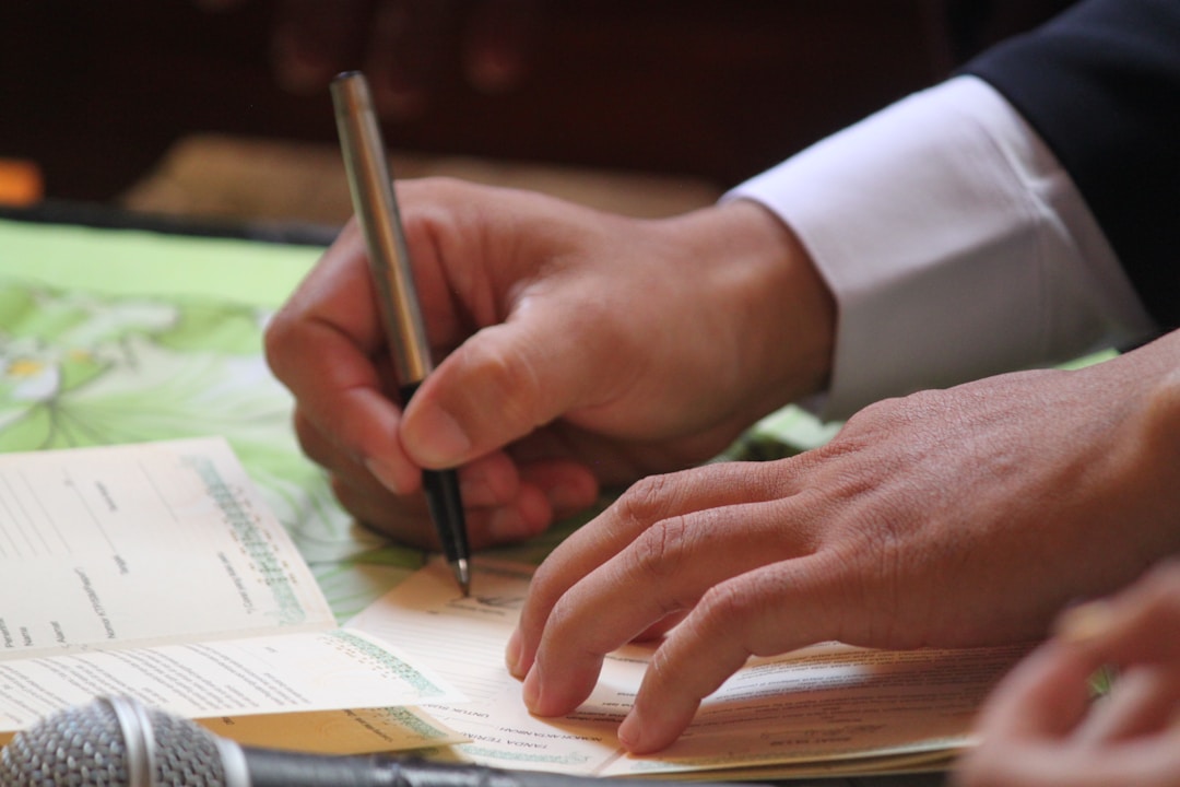 Business owner reviewing financial documents and strategic options at desk