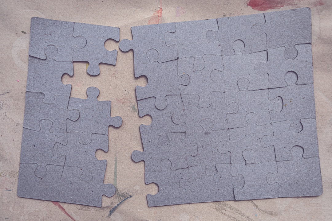 Scattered puzzle pieces representing complex business challenges and problem-solving