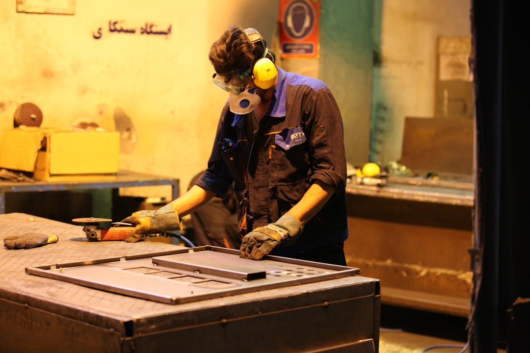 Skilled worker performing precision assembly or value-added service on product