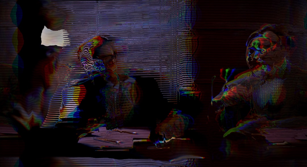 Two professionals in focused conversation during business negotiation discussion