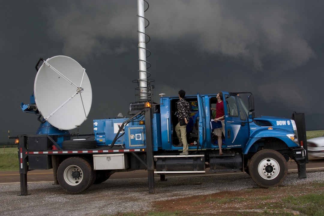 Weather radar screen displaying storm patterns and warning signs for forecasting