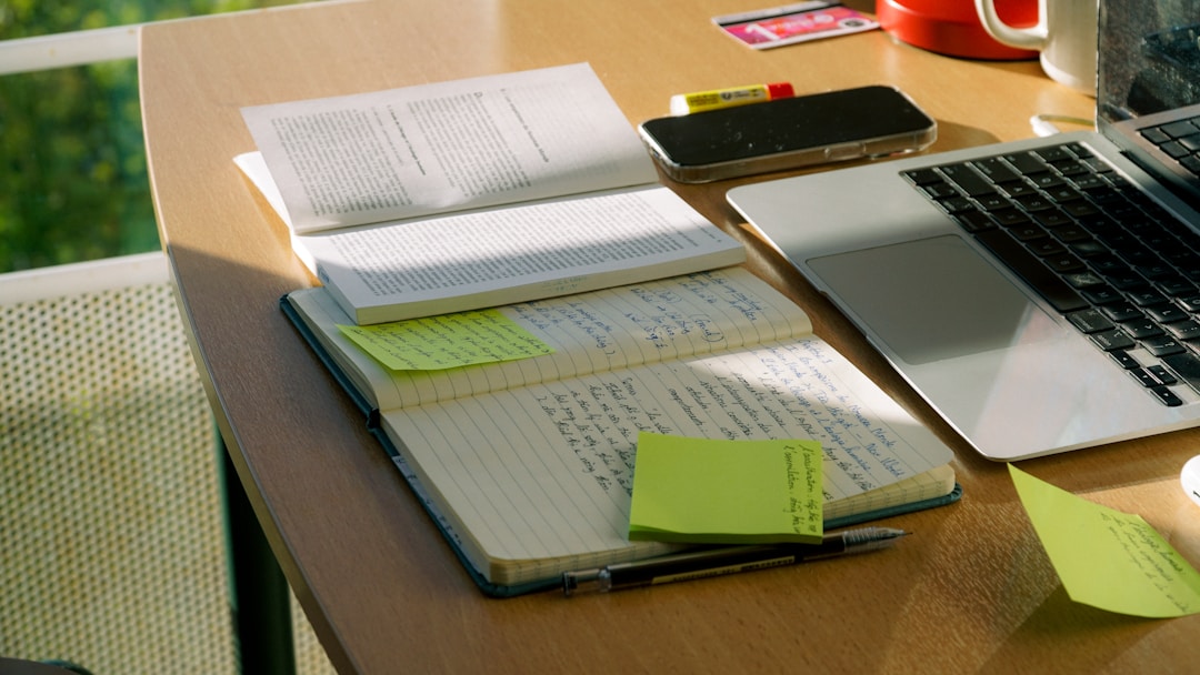 Training materials and documentation spread across desk during workforce planning session