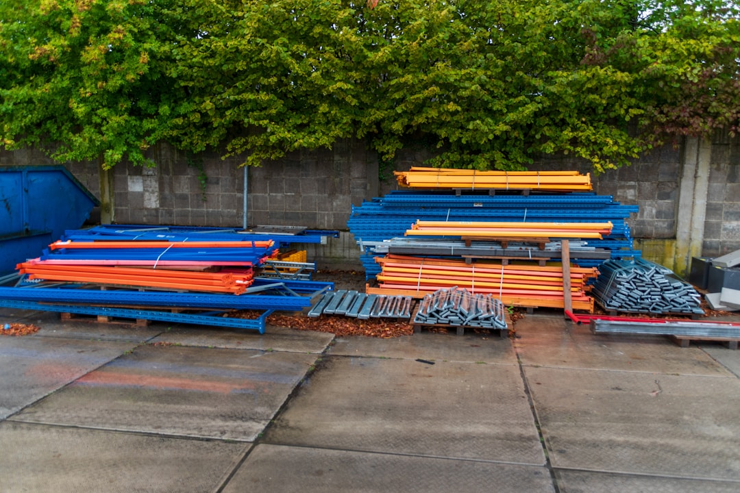 Well-organized manufacturing warehouse with systematically arranged inventory and clear location markers