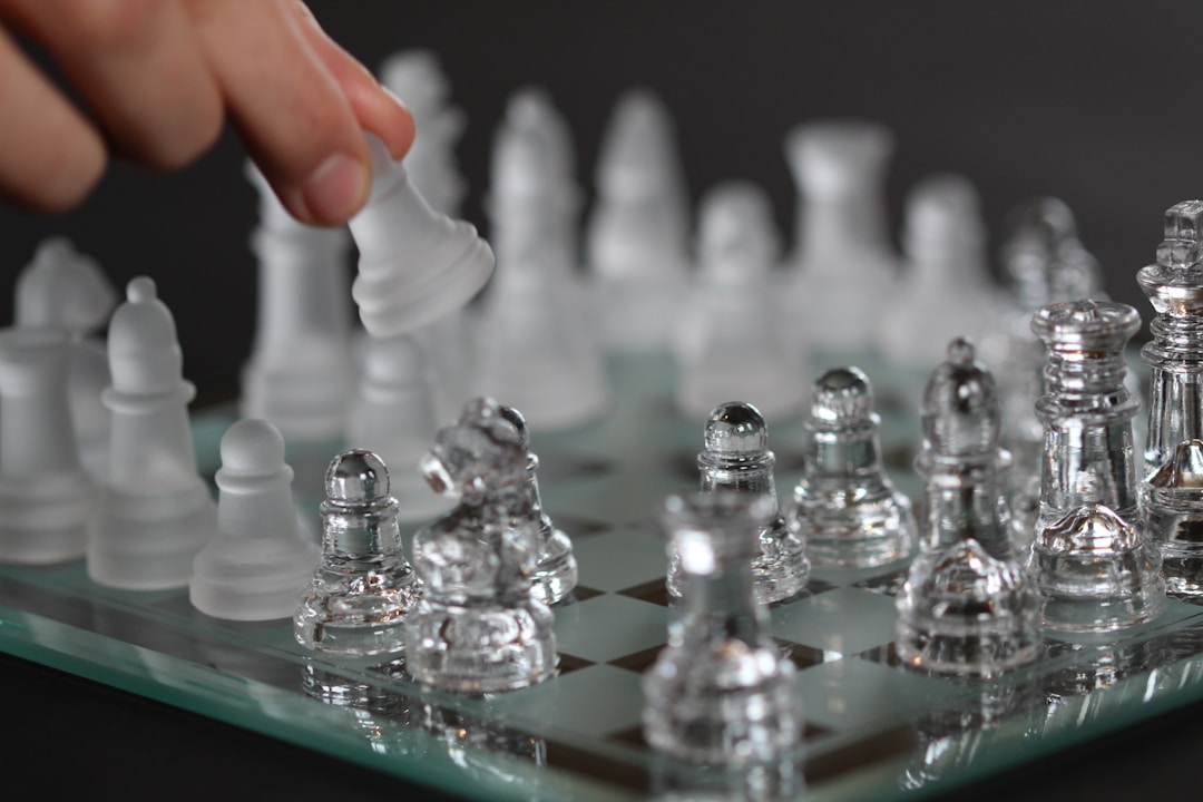 Chess pieces on board representing strategic negotiation and tactical planning