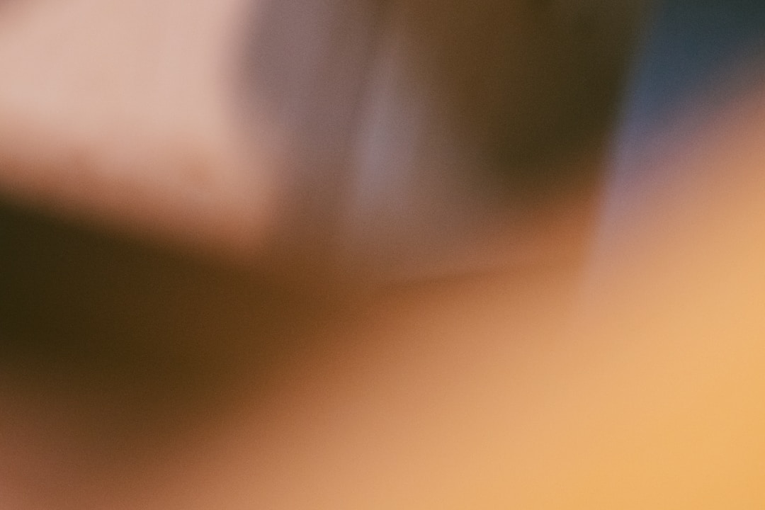 Insurance policy document with pen and financial charts visible