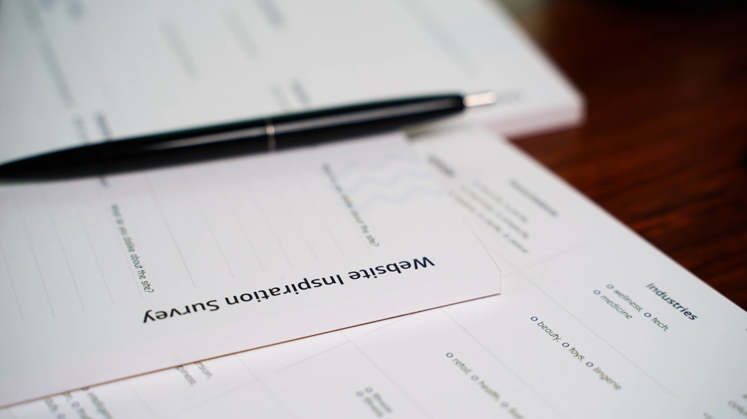 Attorney reviewing legal contract documents with business owner during transaction planning