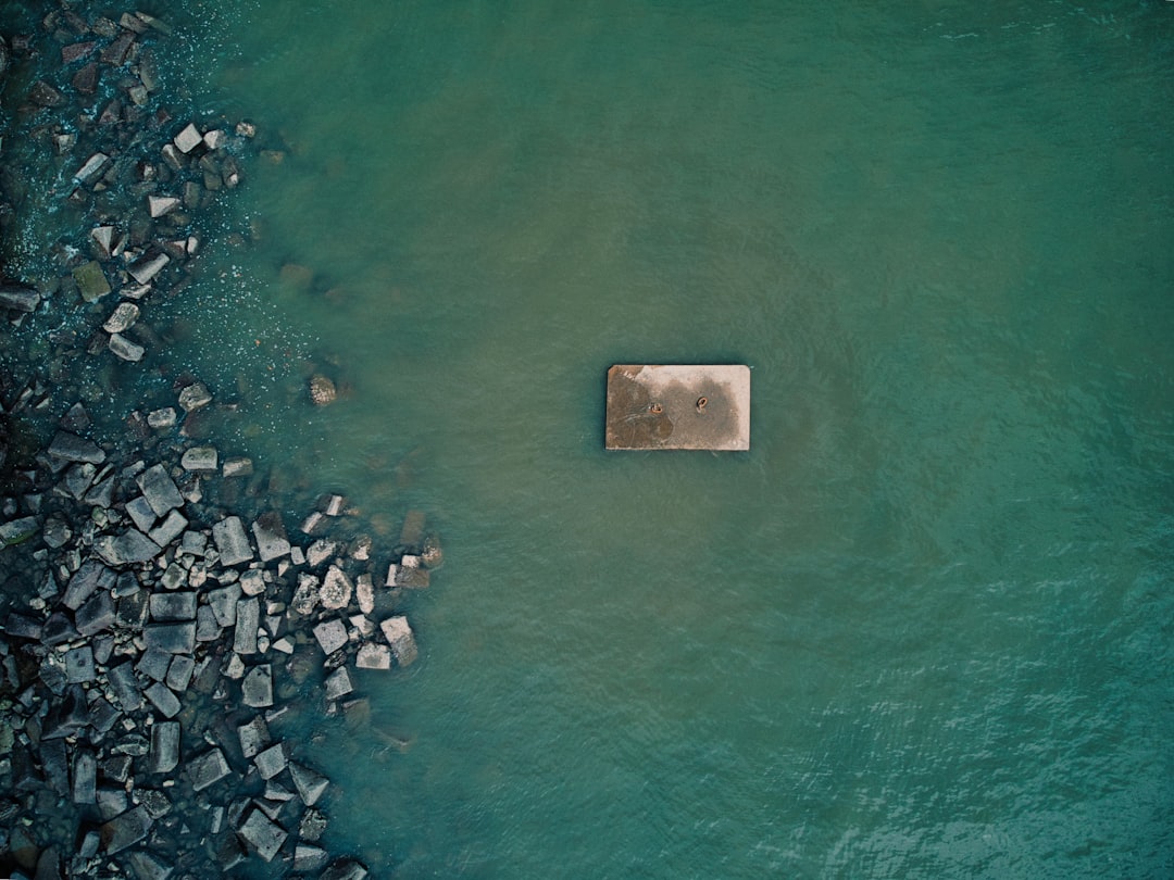 Dark storm clouds forming on the horizon over an otherwise clear landscape
