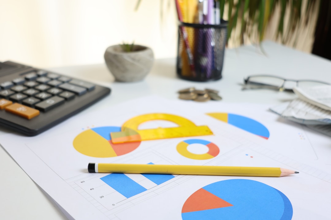 Financial calculator and spreadsheet showing investment analysis with charts and numerical data