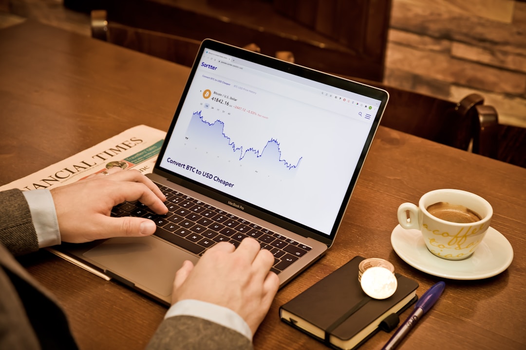 Business owner studying operational performance data on screen, examining capacity metrics and utilization statistics