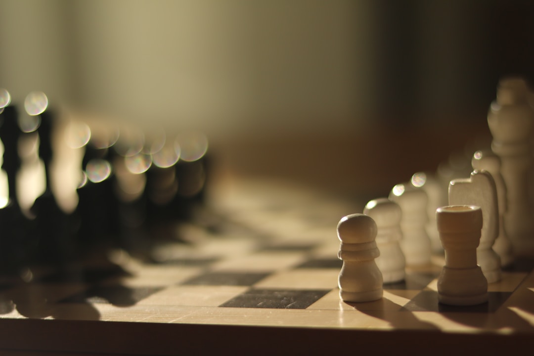 Chess pieces on board representing strategic thinking and calculated moves