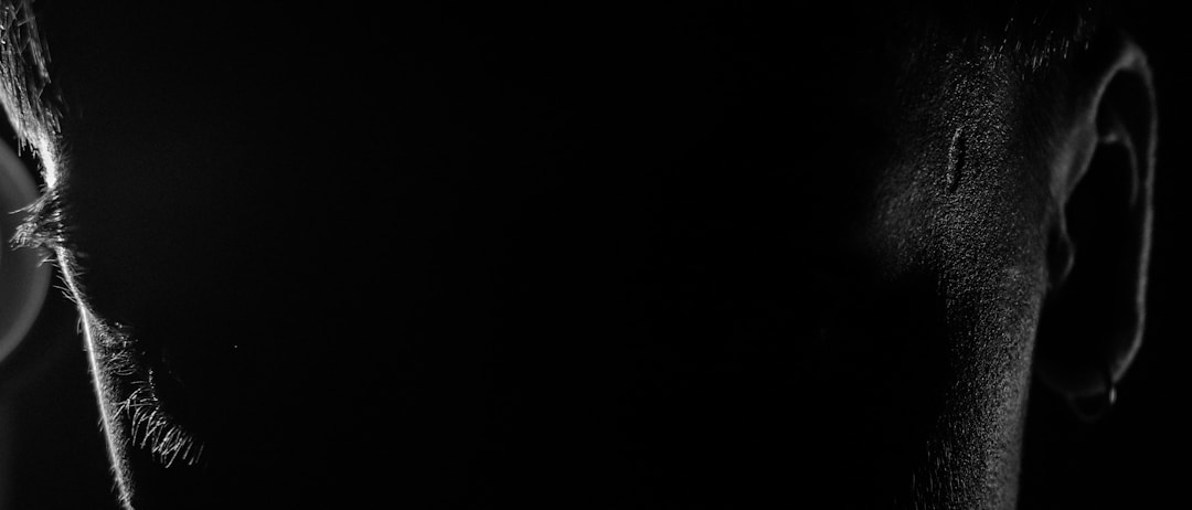 Close-up of employment contract documents and legal papers being reviewed during due diligence