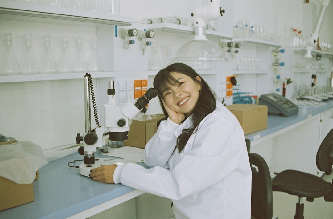Person reviewing printed charts and reports at a desk
