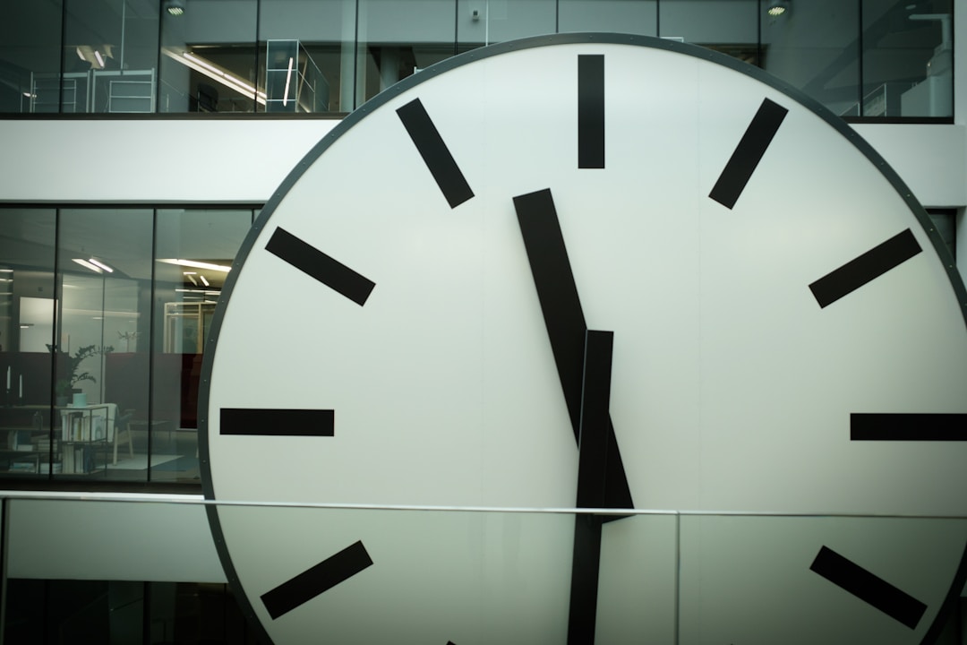 Clock and calendar symbolizing time management and deadline pressure in business context