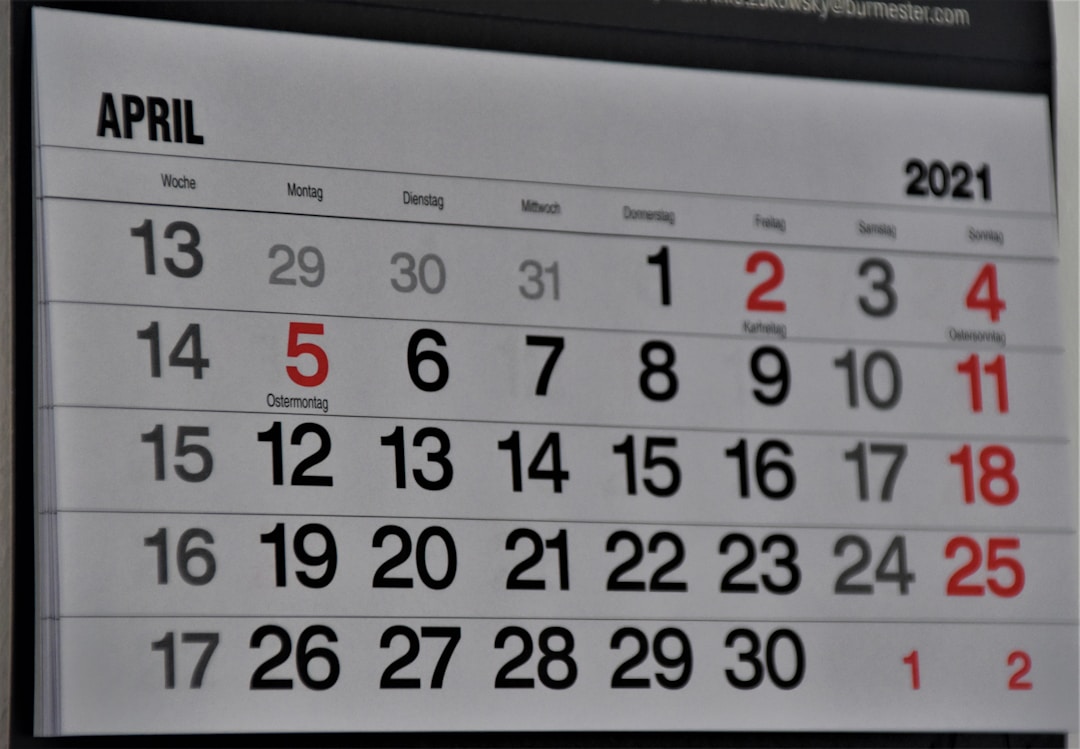 Wall calendar with important dates circled and marked for planning