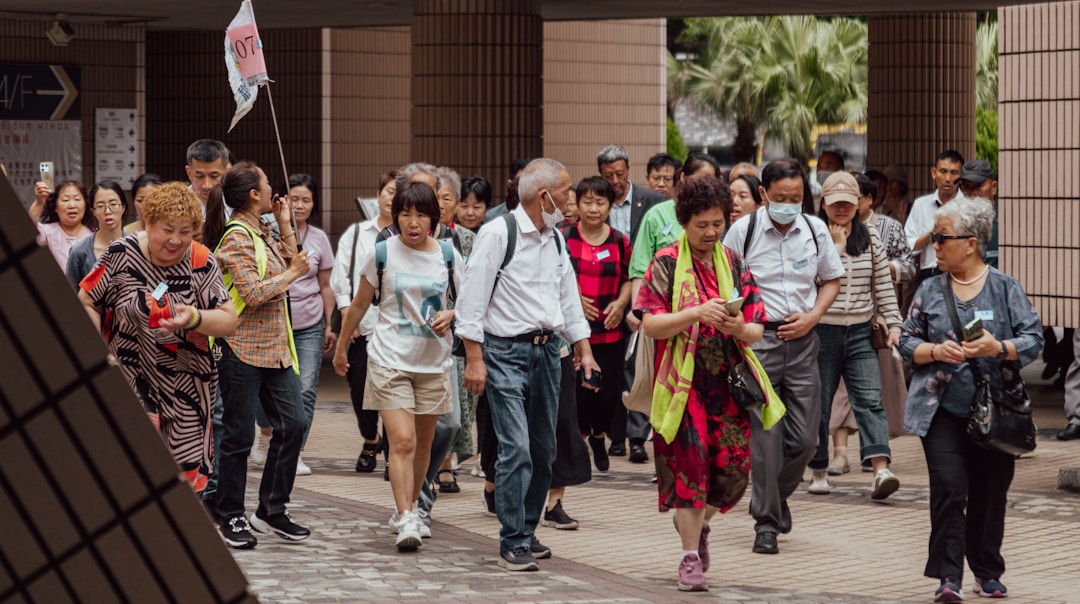Senior leader observing team making independent decisions without direct involvement
