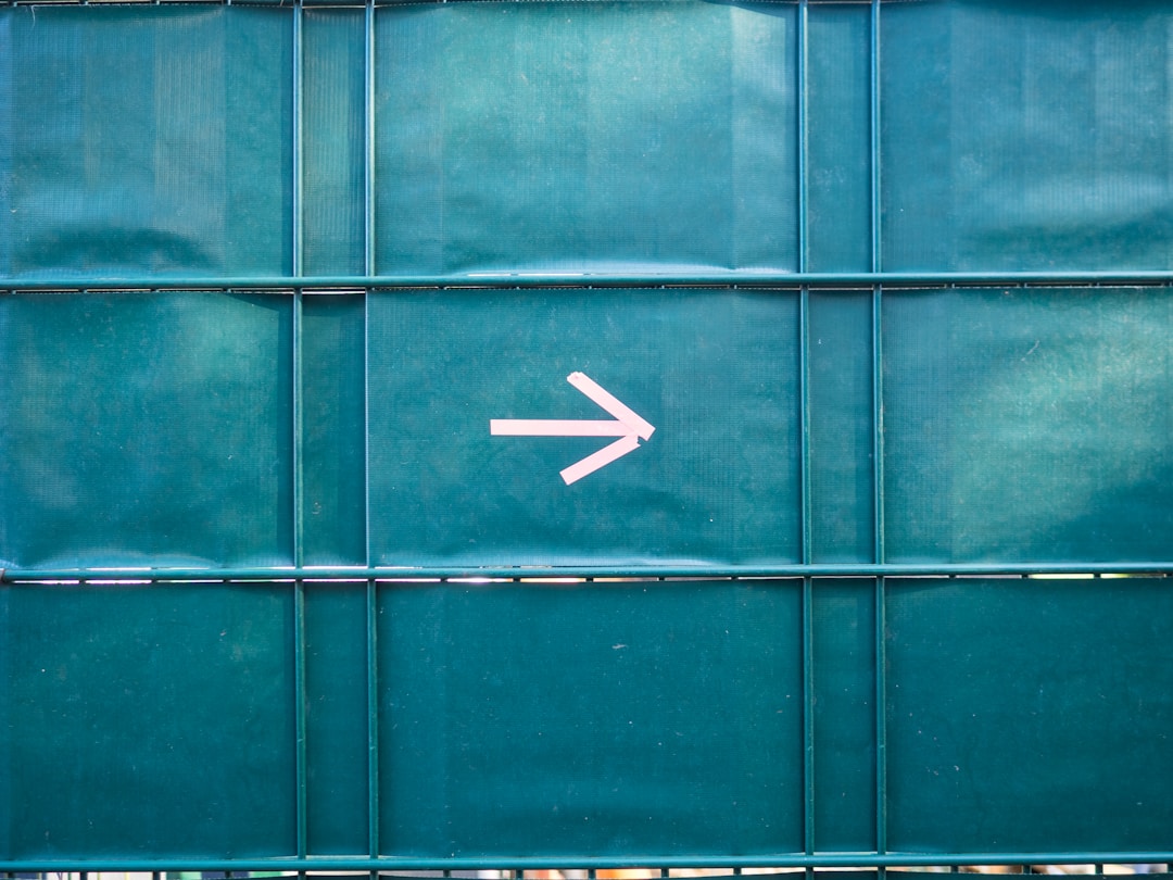 Person at crossroads marking transition between two life phases or identities